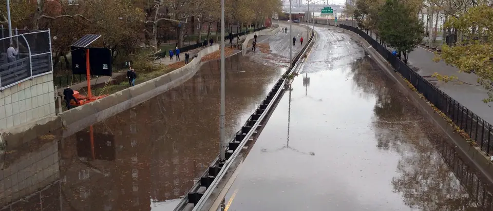 Flood water standing on FDR Drive along the East River after Hurricane Sandy